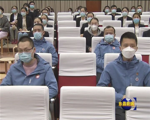 我區(qū)舉行援鄂青年典型事跡報告會